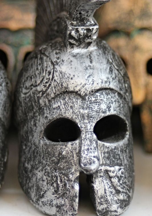 The photo shows the helmet of a Greek warrior