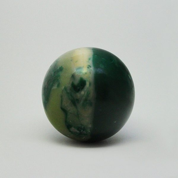 a photo of a jade sphere from another angle