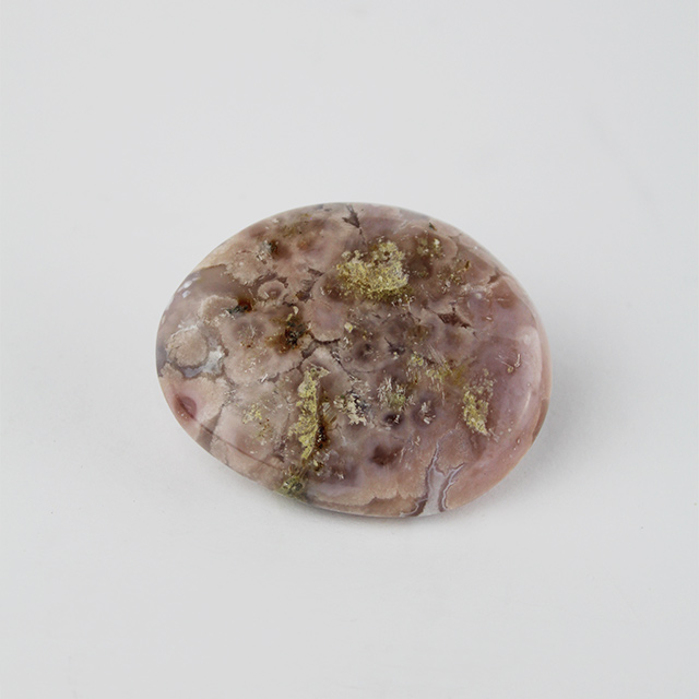 a photo of a flower agate palm stone